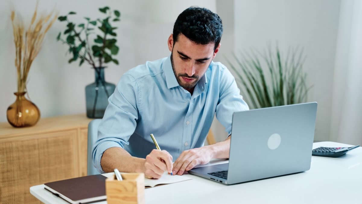 Disgruntled Contractor looking at computer
